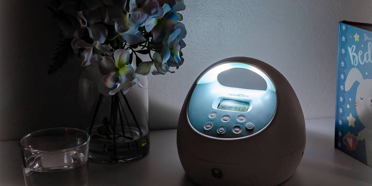 breast pump on babies dresser